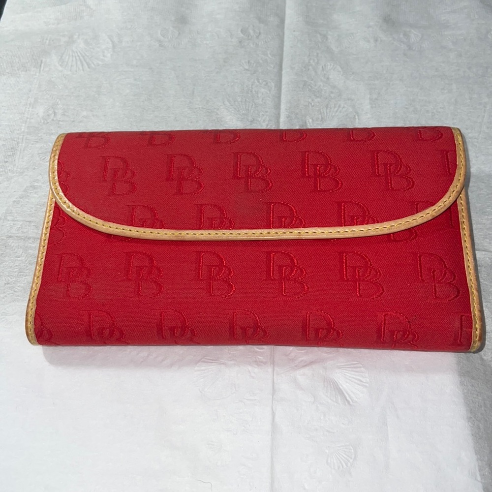Used Dooney and Bourke checkbook wallet.